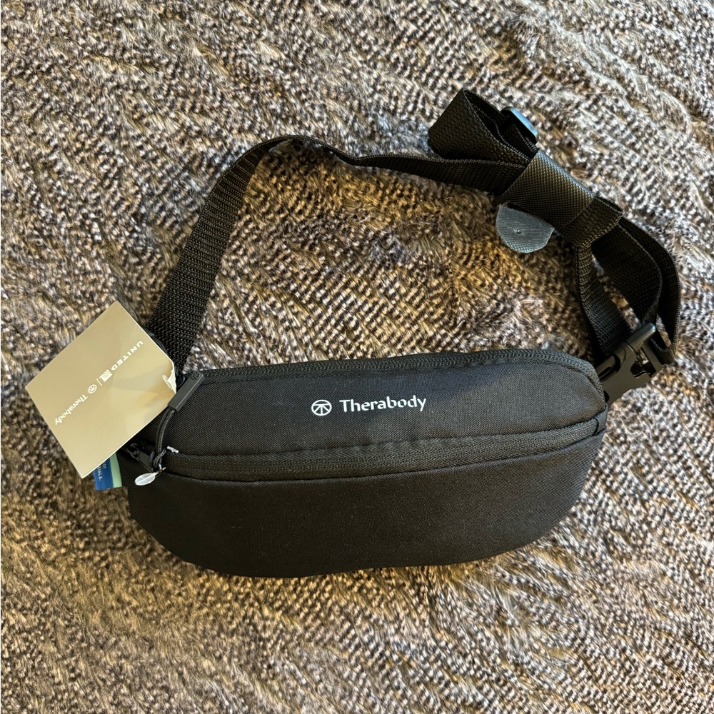 United x Therabody toiletry kit